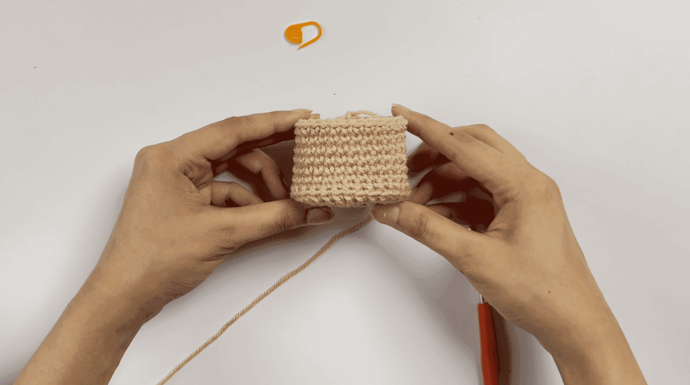 Crochet sunflower pot sides: Rounds 6-11 showing six stacked rounds of single crochet building cylindrical pot height in beige yarn